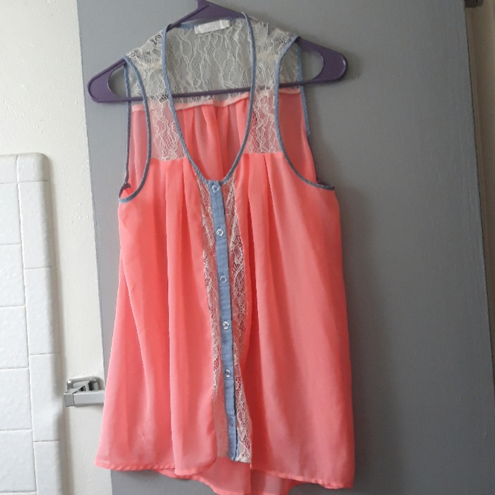 Lush sheer sleeveless blouse